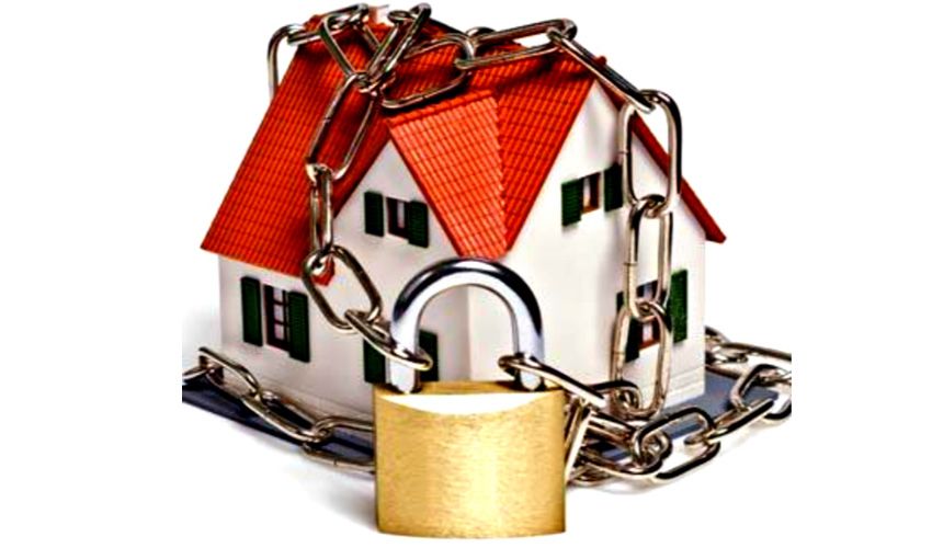 Brunssumse woning met ketting en slot als zinnebeeld Brunssumse woning met ketting en slot als zinnebeeld